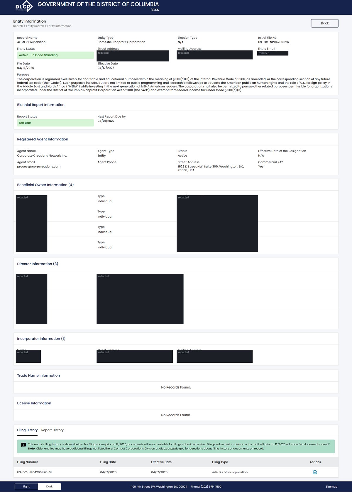 A single business entity record on the District of Columbia register at corponline.dcra.dc.gov, showing record name, entity type and election type, entity status, colour coded, the initial file number, street and mailing addresses, an entity email address, file date and effective date. Personal names and addresses in this image are redacted.